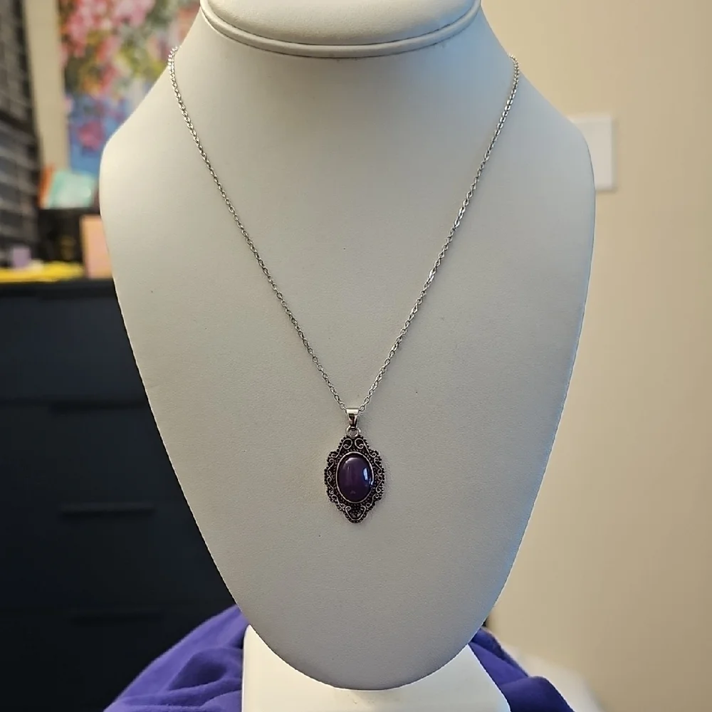 Elegant Silver Necklace with Purple Pendant
